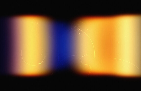 Vintage 35mm film burn streak texture overlay.Professional cinematic film overlay background.Old school film burn rainbow overlay texture for retro poster design.