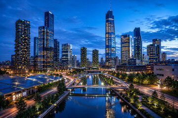 Fototapeta premium Modern Futuristic City Skyline Waterfront Architecture at Night