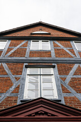 Obraz premium Low angle view of historic timber framed building facade