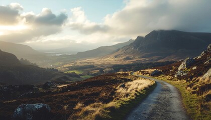 Obraz premium Golden hour over rugged mountain river valley.