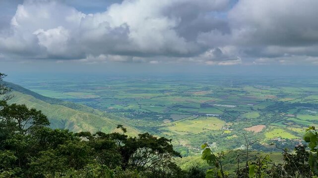 Panoramic view of the Cauca River Valley between two mountain ranges