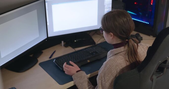 Girl with Glasses Drawing Picture on Desktop Computer Monitor. 4K 10-bit