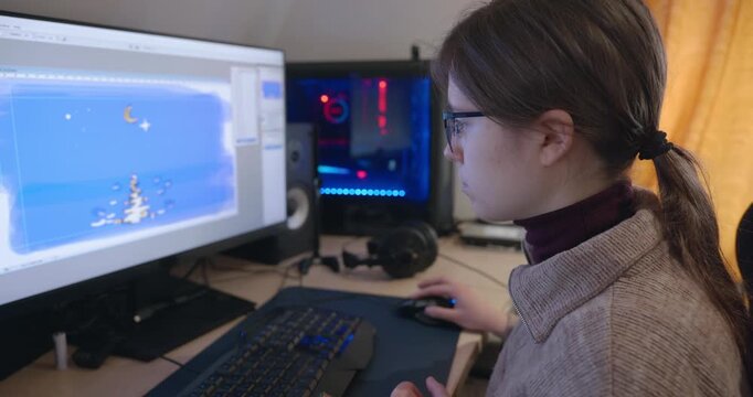Girl with Glasses Drawing Picture on Desktop Computer Monitor. 4K 10-bit