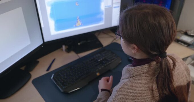 Girl with Glasses Drawing Picture on Desktop Computer Monitor. 4K 10-bit