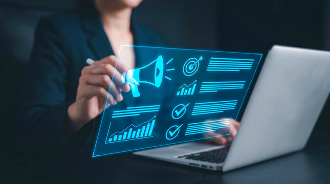 Professional using holographic interface on laptop for digital marketing analytics and strategy planning