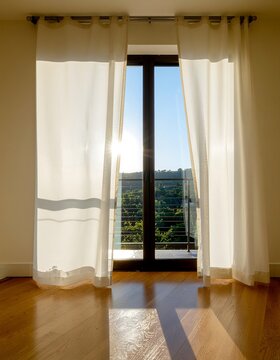 Modern urban skyline view through window blinds.