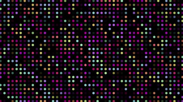 A vibrant grid of multicolored dots creates a dynamic and colorful background.