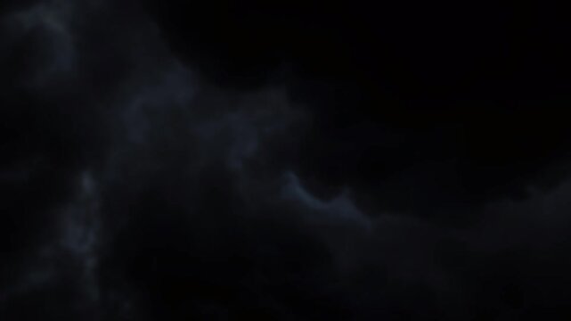 Storm clouds gather in a dark and moody sky to create a dramatic atmosphere for weather footage.