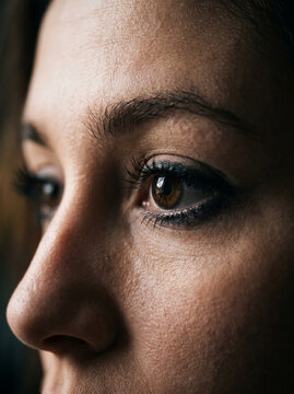 Close Up Portrait Shot of Woman Eye with Dark Eyeliner Makeup