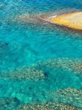 Blue azure sea and rock.