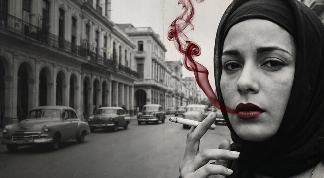 A woman with a cigarette.Black and white street portrait of a woman with a covered head with a cigarette, with an emphasis on red smoke, an atmospheric artistic image in retro aesthetics.