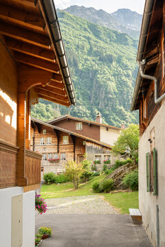 Guttannen, Switzerland. Traditional Swiss alpine chalets framed by mountain scenery in the Bernese Oberland