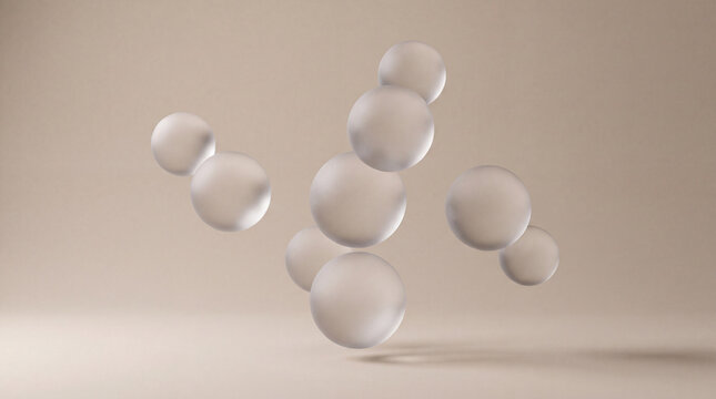 Abstract translucent spheres floating in a beige studio setting