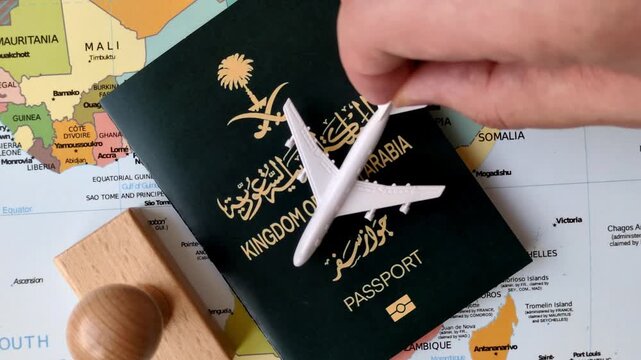 Saudi Arabia passport or id document with tickets for flight, travel, border crossing. Saudi Arabia passport and tickets as a background for your design