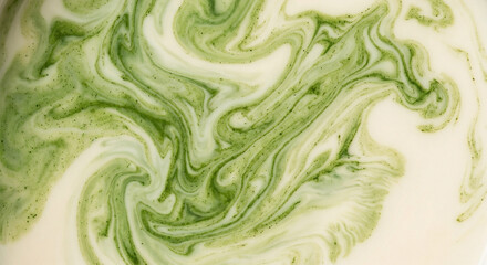 Obraz premium Abstract Swirling Liquid Pattern of Matcha Green Tea and Milk