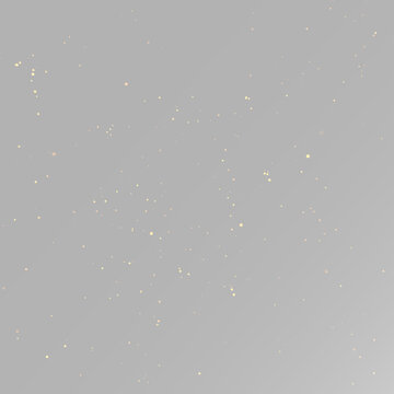 Golden glitter dust scattered of sparkling metallic particles with soft luxury glow