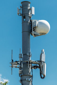Telecommunications Tower Supporting Wireless Data Transmission And Network Coverage Equipment Above Clouds