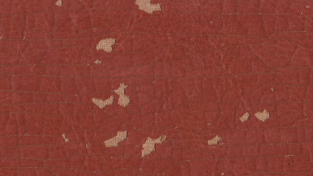 4k horizontal slow motion footage of antique light brown leather texture with missing areas, cracked surface, scratches and other rough features