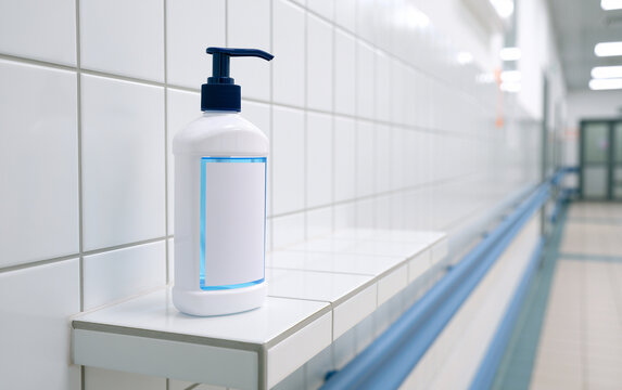 Cleanliness and Hygiene: Hand Sanitizer Dispenser in a Medical Hallway