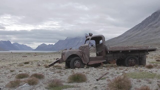 Abandoned Truck and Fuel Barrels in Ikkatteq, East Greenland