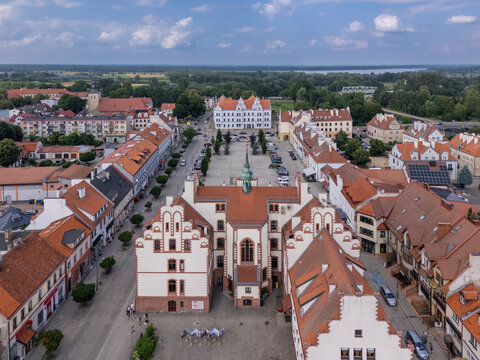 Pisz Poland aerial drone view of historic town square in Masuria, Poland