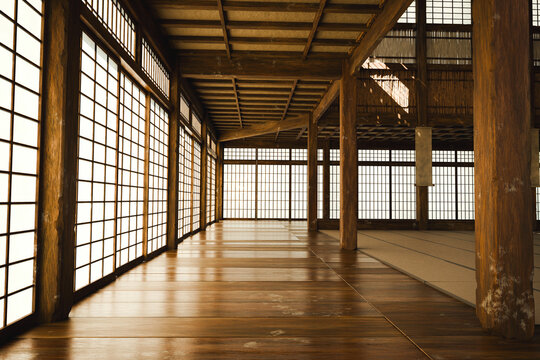 3D rendering of the interior of a traditional Japanese dojo bathed in warm light
