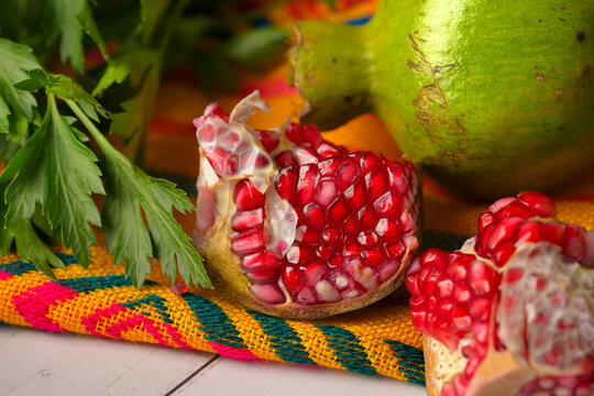 Seasonal fruits for preparing chiles en nogada. Fresh pomegranate