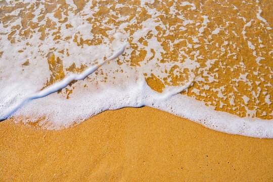 White Sea Foam Wave on Yellow Sandy Beach &mdash; Summer Coastal Background