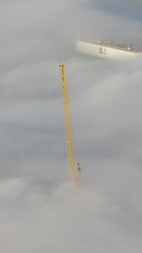construction cranes above the clouds in dubai 
