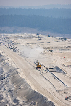 Open Pit Mining Landscape With Excavator and Pipelines in British Columbia Canada Industrial Site