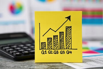 Fototapeta premium Business growth analysis with quarterly financial report chart and strategy graph