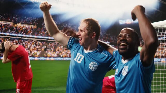 Joyful diverse soccer players celebrating winning goal on pitch, with arms raised and clenched fists, devastated opponents while rivals hugging teammates.