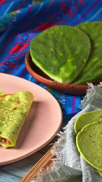Traditional Mexican food. Fresh nopal cactus leaves, green quesadillas and green nopal tortillas