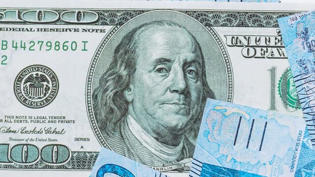 Close-up of Brazilian one hundred real banknotes arranged as a money background, representing finance, economy, banking, wealth, investment, inflation, business, savings, and financial concepts in Bra