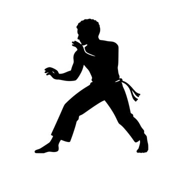 Silhouette of a Man Performing Brazilian Capoeira Martial Arts Movement