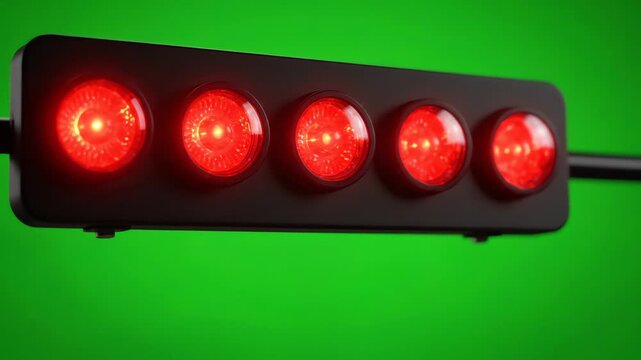 Digital racing start lights countdown from red to bright green on chroma key green screen background with sequential light motion