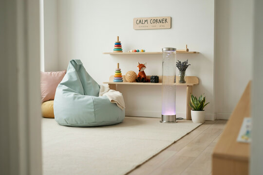 Sensory Calm Down Corner in Elementary School Classroom | Neurodivergent Student Support Room with Cozy Bean Bag, Sensory Toys, and Relaxing Light Projector