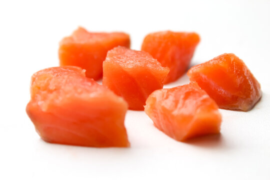 flat lay of diced raw salmon	
