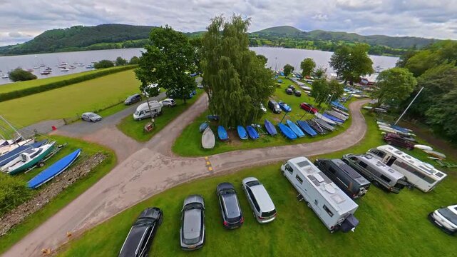 Lake Districts Valley and Mountains of UK. Drone Camera View Was Captured From Medium High Altitude During Mostly Dramatic Cloudy Day of Summer. The Lake District, located in Cumbria in North West UK
