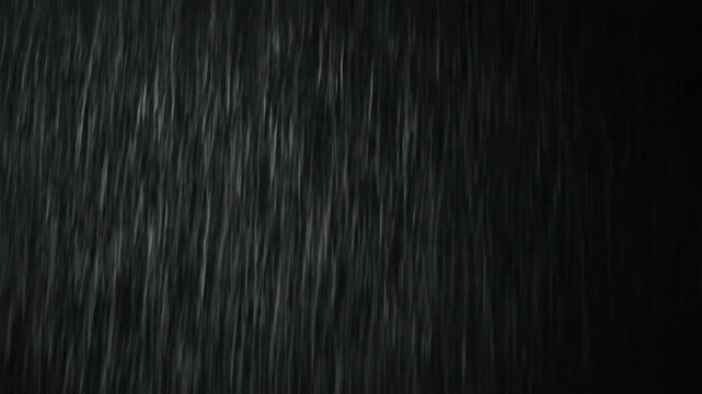 Dark Rainfall Falling Fast in Night Sky.