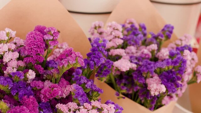 Purple and Pink Statice Flower Bouquets in Brown Paper Wrap