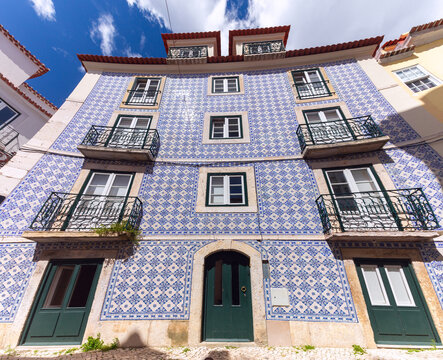 Traditional azulejo tiled residential building facade in Lisbon, Portugal