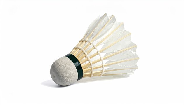 White feathered shuttlecock with a grey base and green band, isolated