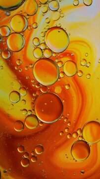 Vibrant Orange and Yellow Oil Bubbles Macro Video Generative AI