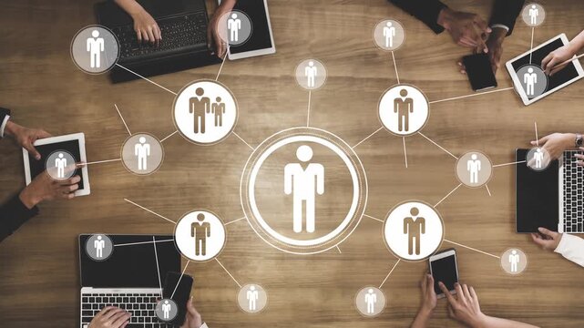 People Connected Through Technology in a Collaborative Network with Laptops and Tablets on a Wooden Table Creating a Modern Workspace Gluon.