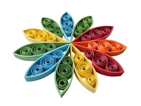 Colorful paper quilling flower shape with petals arranged in a circle during daylight