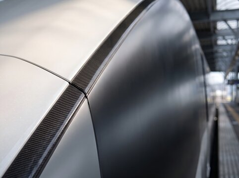 Next generation high speed train aerodynamic nose panel with carbon fiber seam macro texture in landscape layout