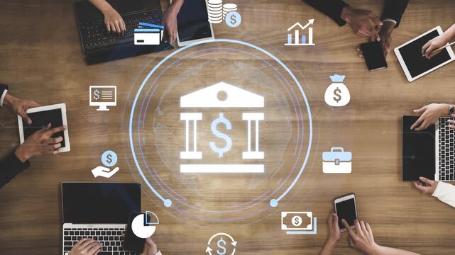 Diverse Group of Professionals Engaged in Digital Financial Planning with Technology Tools on a Wooden Table Featuring Financial Icons and Emblems. Entropy.