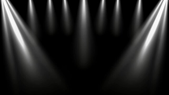 Motivational quote consistency beats motivation every single time displayed under dramatic stage spotlight beams against a dark black background