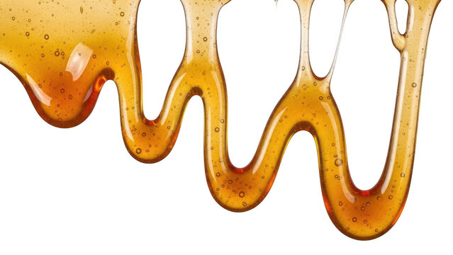 Golden liquid honey dripping down on white background with dripping